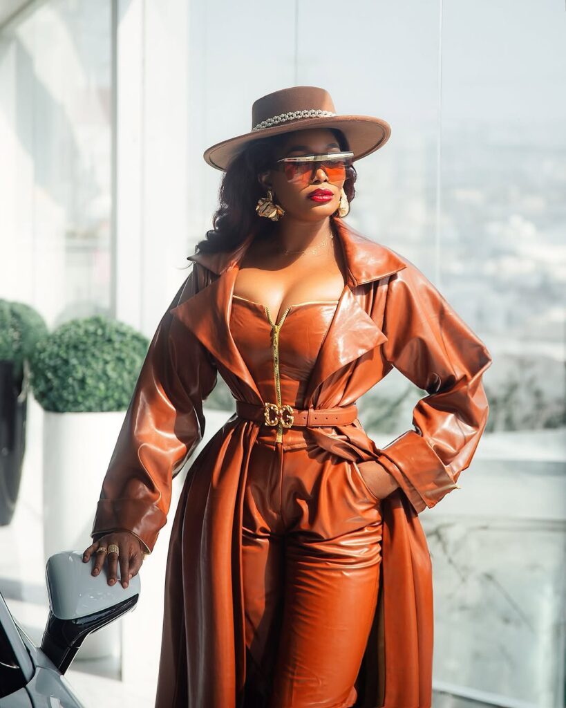 Brown Leather, Gold Accents & A Whole Lot of Presence, Kiekie Owns This Look