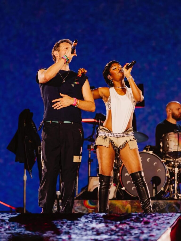Ayra Starr Joins Coldplay On Stage, Serving Looks from Fishnets to Cowboy Hats