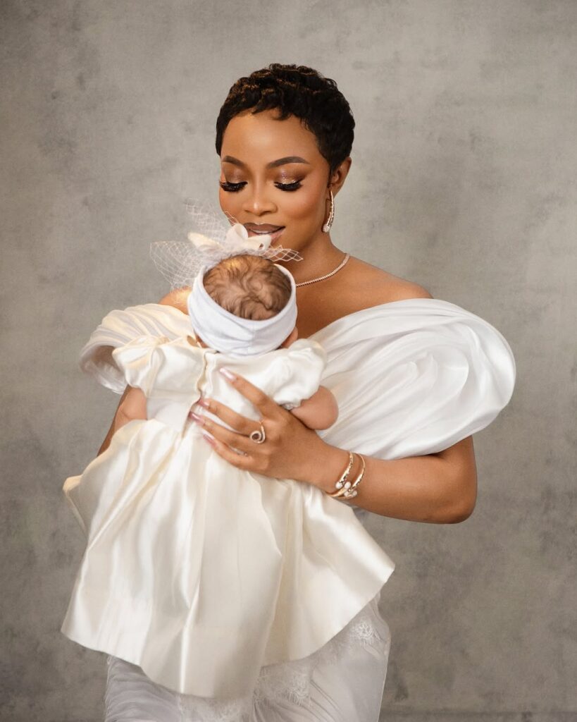 Toke Makinwa and Daughter Yakira Shine in Matching White Outfits for Dedication